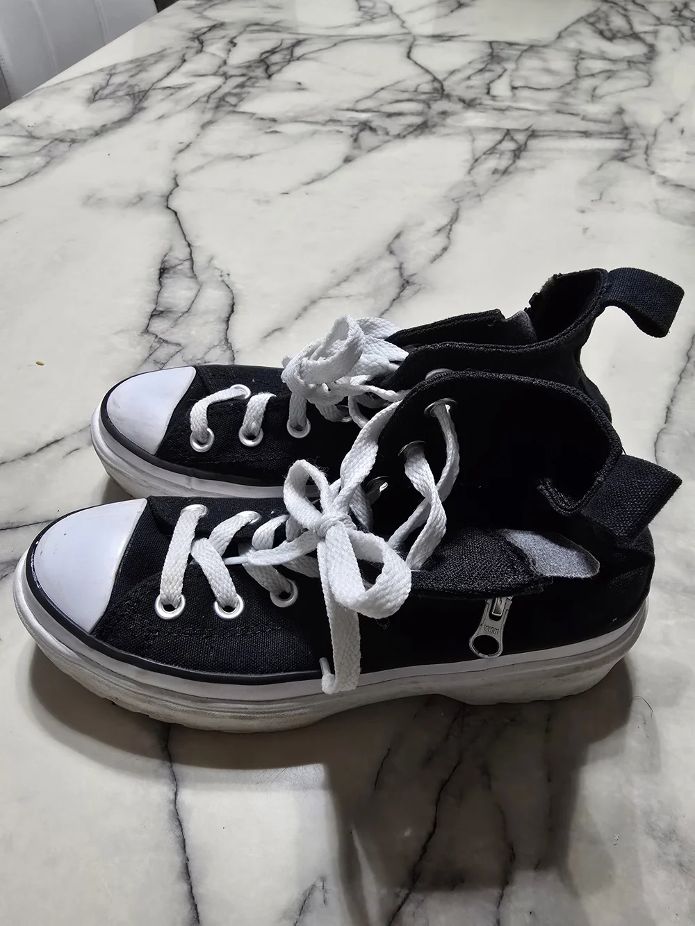 Converse Black and White High-Top Sneakers